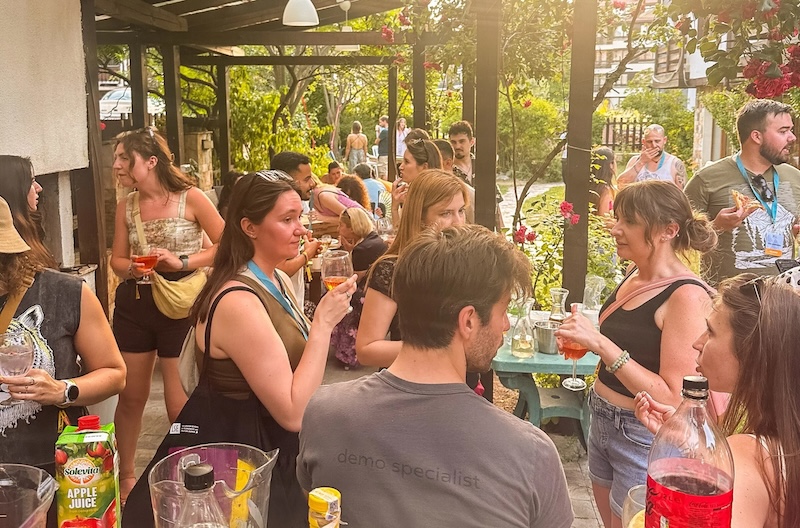 Digital nomads socializing at community event